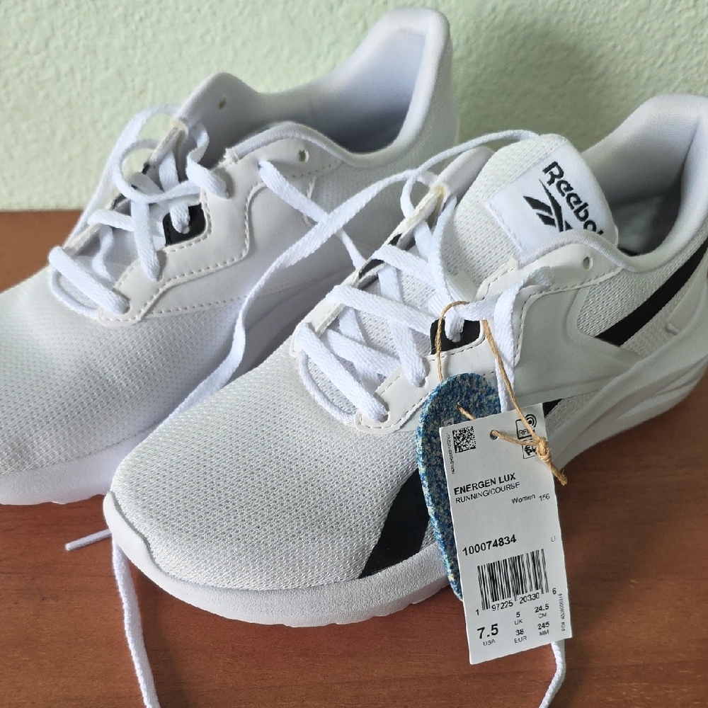 Reebok White Sneakers with Black Stripe Accent